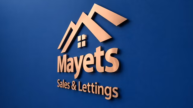 Flat-cut business letters installed on an office wall